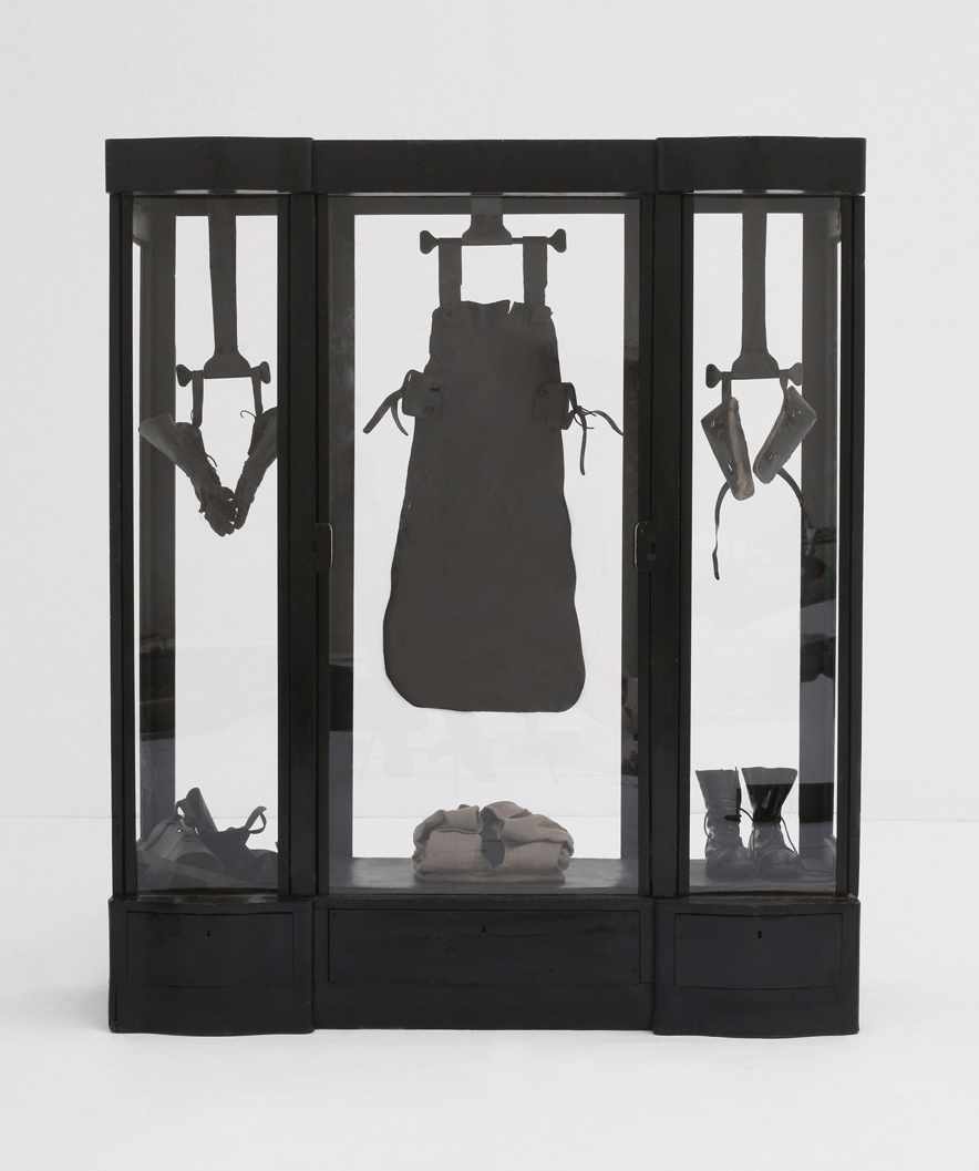 POSSESIA / Primal Elements I / 
2010 / 182 x 215 x 66 / pieces of furniture, glass,  leather, boots, gloves, outfit