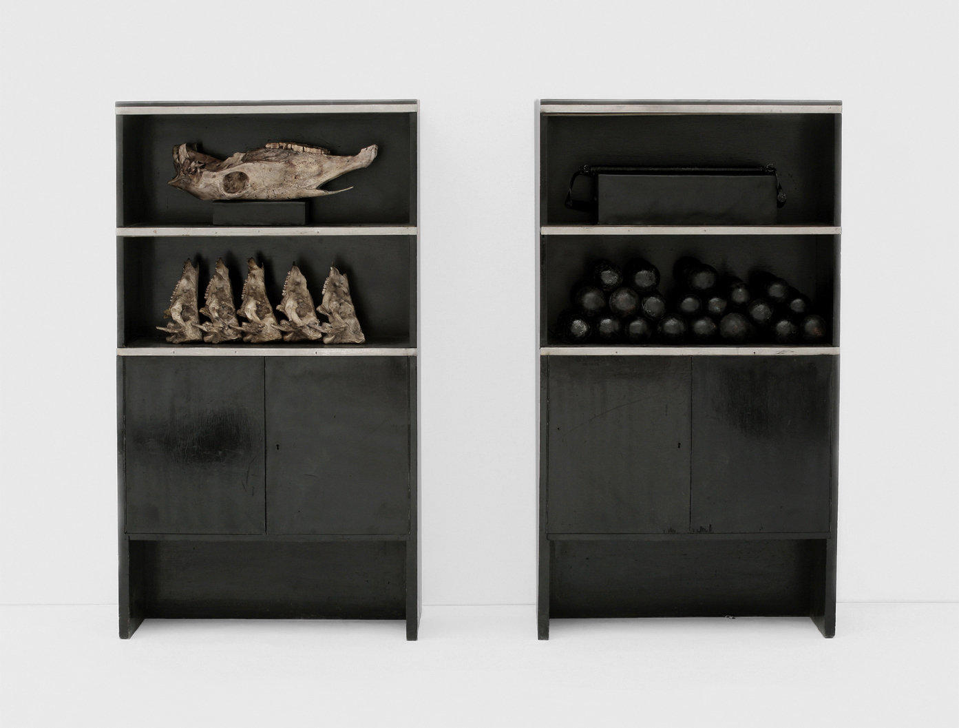 POSSESIA / Primal Elements II /
2010 / each piece 80 x 145 x 35 cm / pieces of furniture, glass, animal
skulls, weights, leather